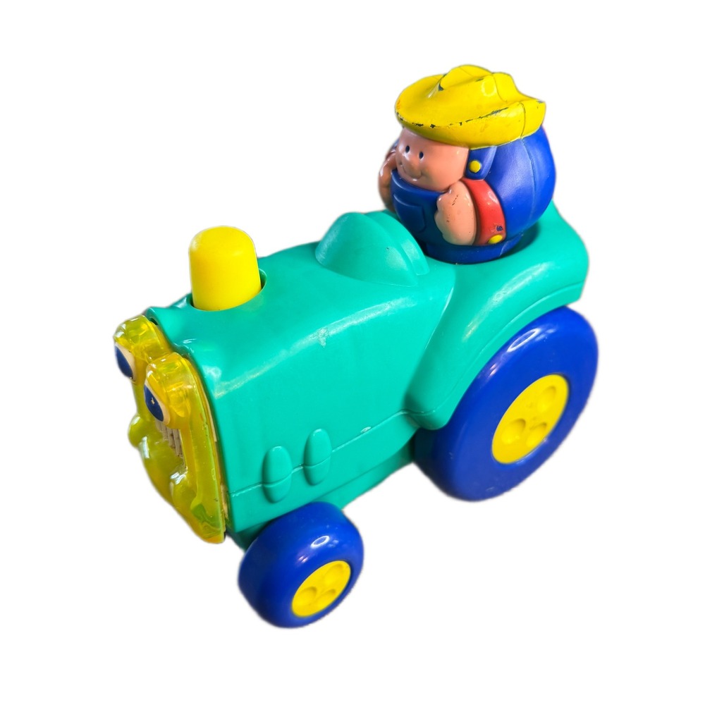 Safety 1st Vintage 2000 Teal Green Tractor Toy with Farmer Figure Blue Wheels